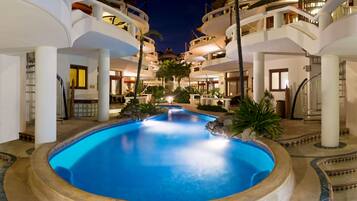 Outdoor pool, pool umbrellas, pool loungers