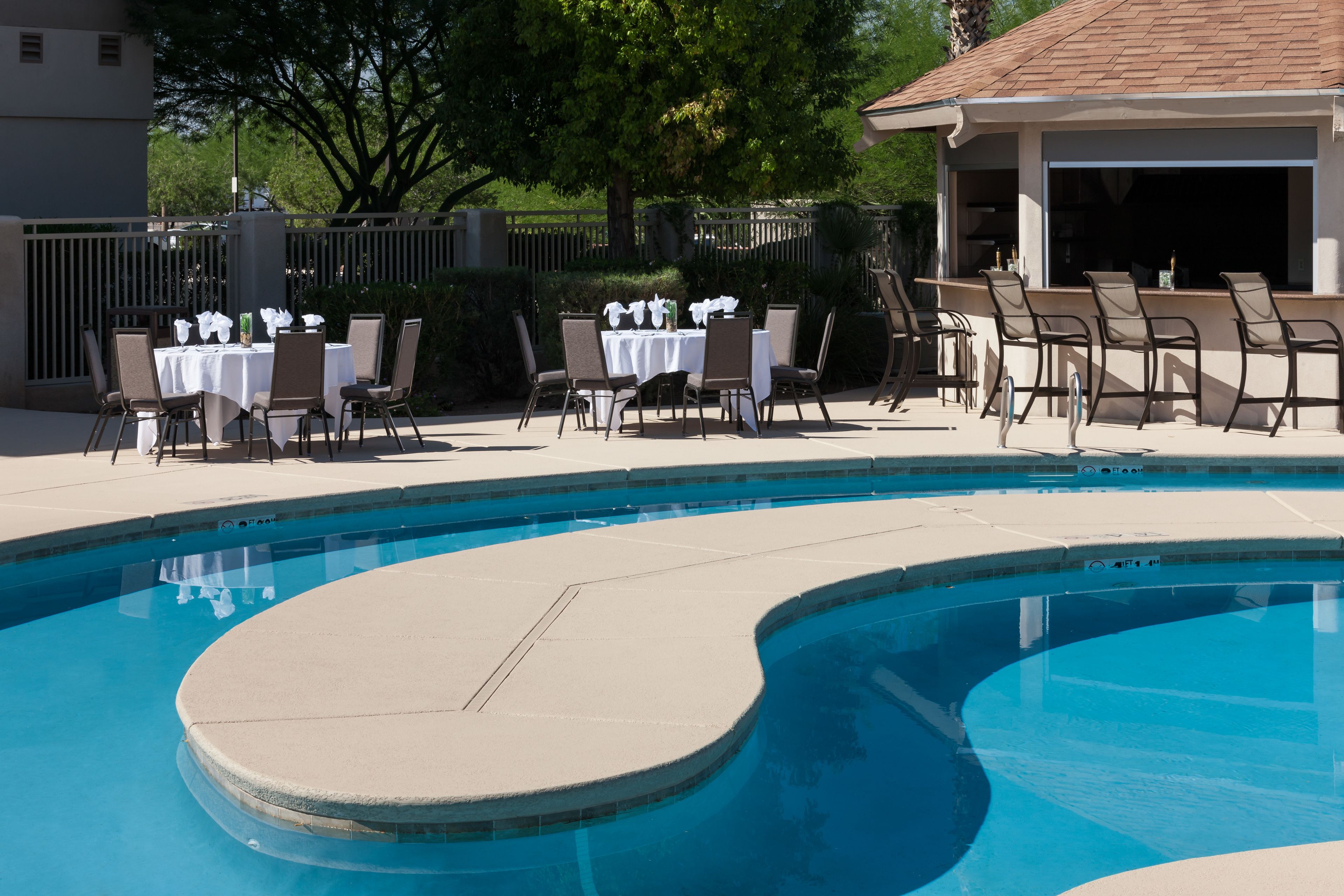 outdoor pool, pool umbrellas, pool loungers