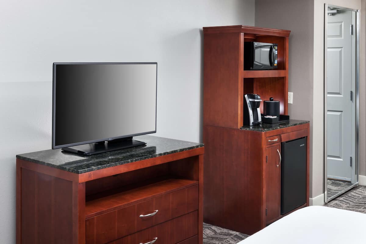 premium bedding, desk, laptop workspace, blackout curtains