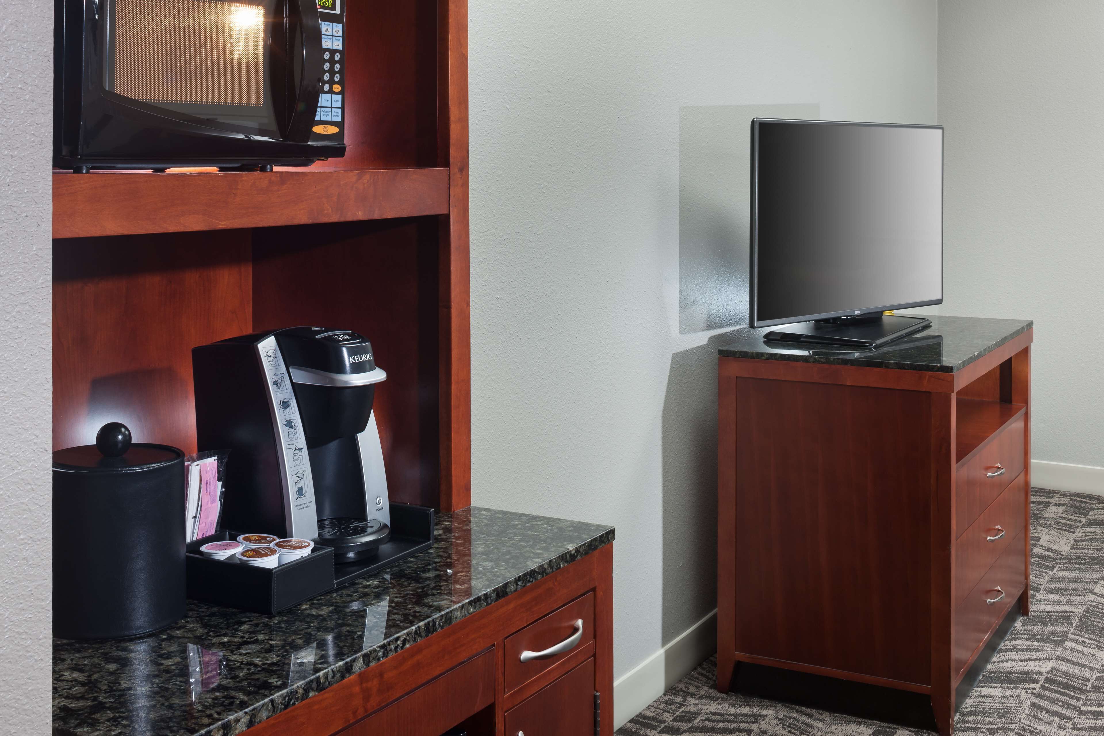 premium bedding, desk, laptop workspace, blackout curtains