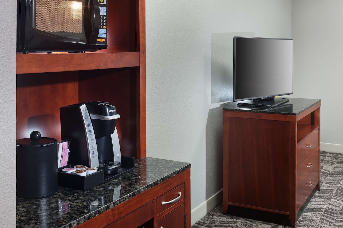 premium bedding, desk, laptop workspace, blackout curtains