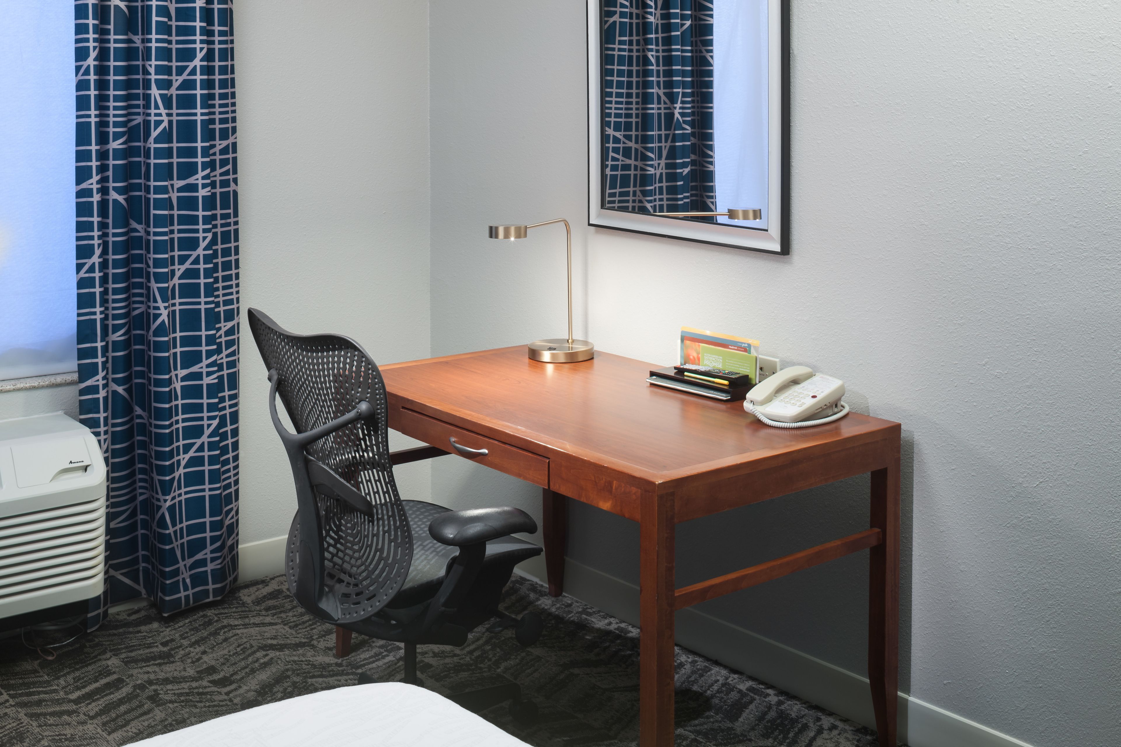 premium bedding, desk, laptop workspace, blackout curtains