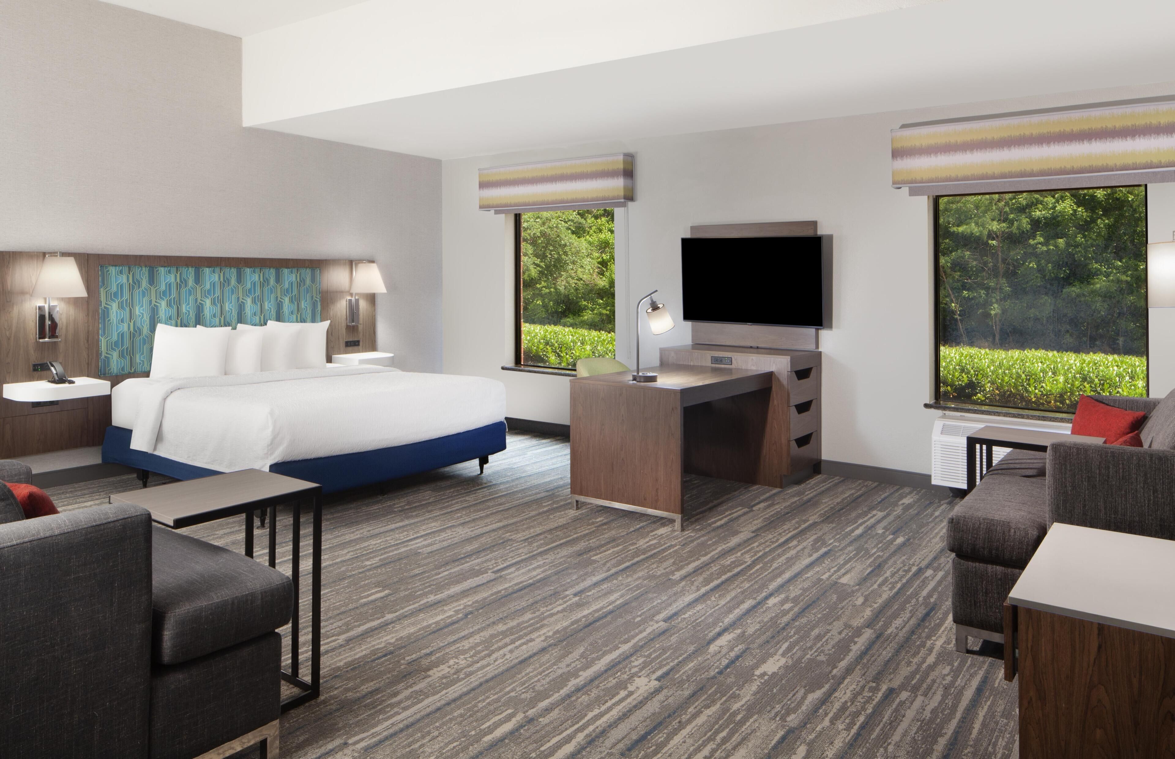 Suite, 1 King Bed, Accessible, Non Smoking | In-room safe, desk, laptop workspace, iron/ironing board