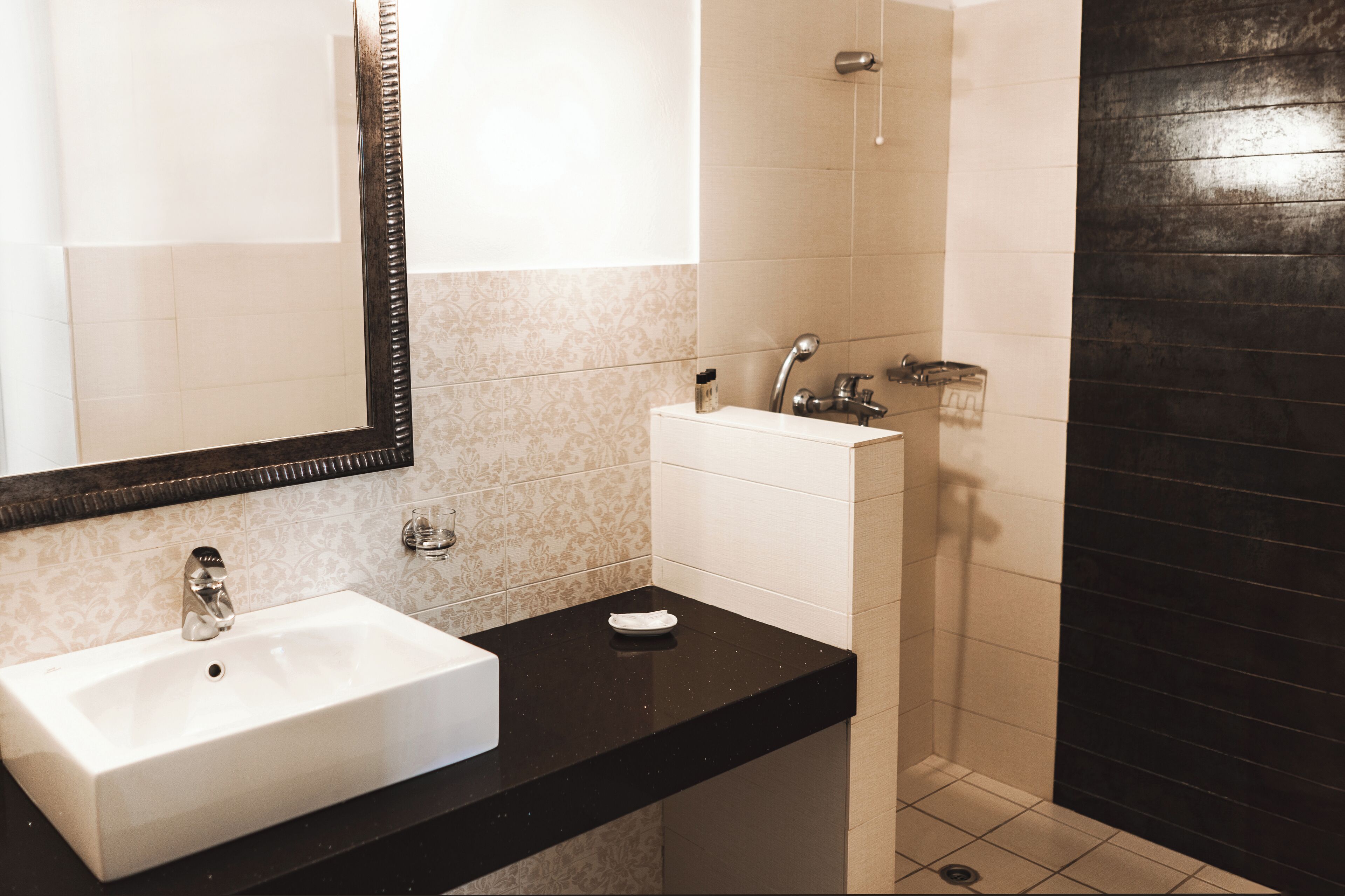 standard triple room (no special view) | bathroom | shower, free toiletries, hair dryer, towels