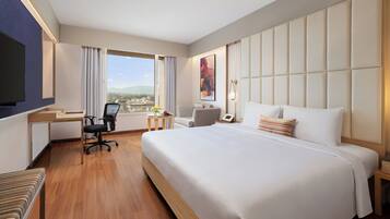 Quarto executivo, 1 cama King | Frigobar, cofres nos quartos, escrivaninha, quartos à prova de som