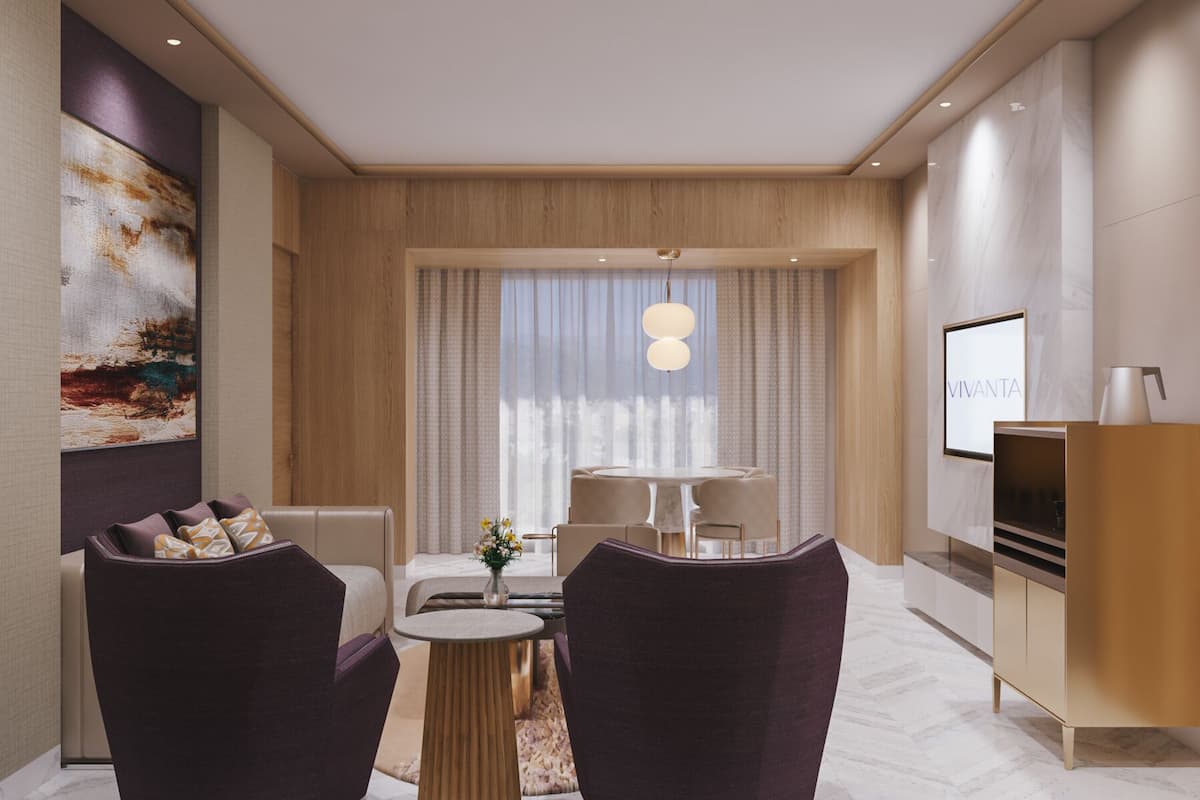 Executive Suite, 1 King Bed | Living area | LCD TV, DVD player, pay movies