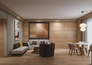 Suite Exécutive, 1 très grand lit | Coin séjour