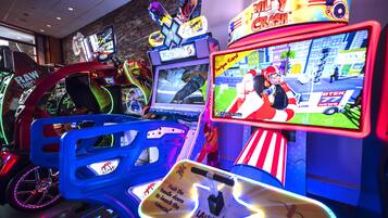 Experience the thrill of classic arcade games in our entertainment area.