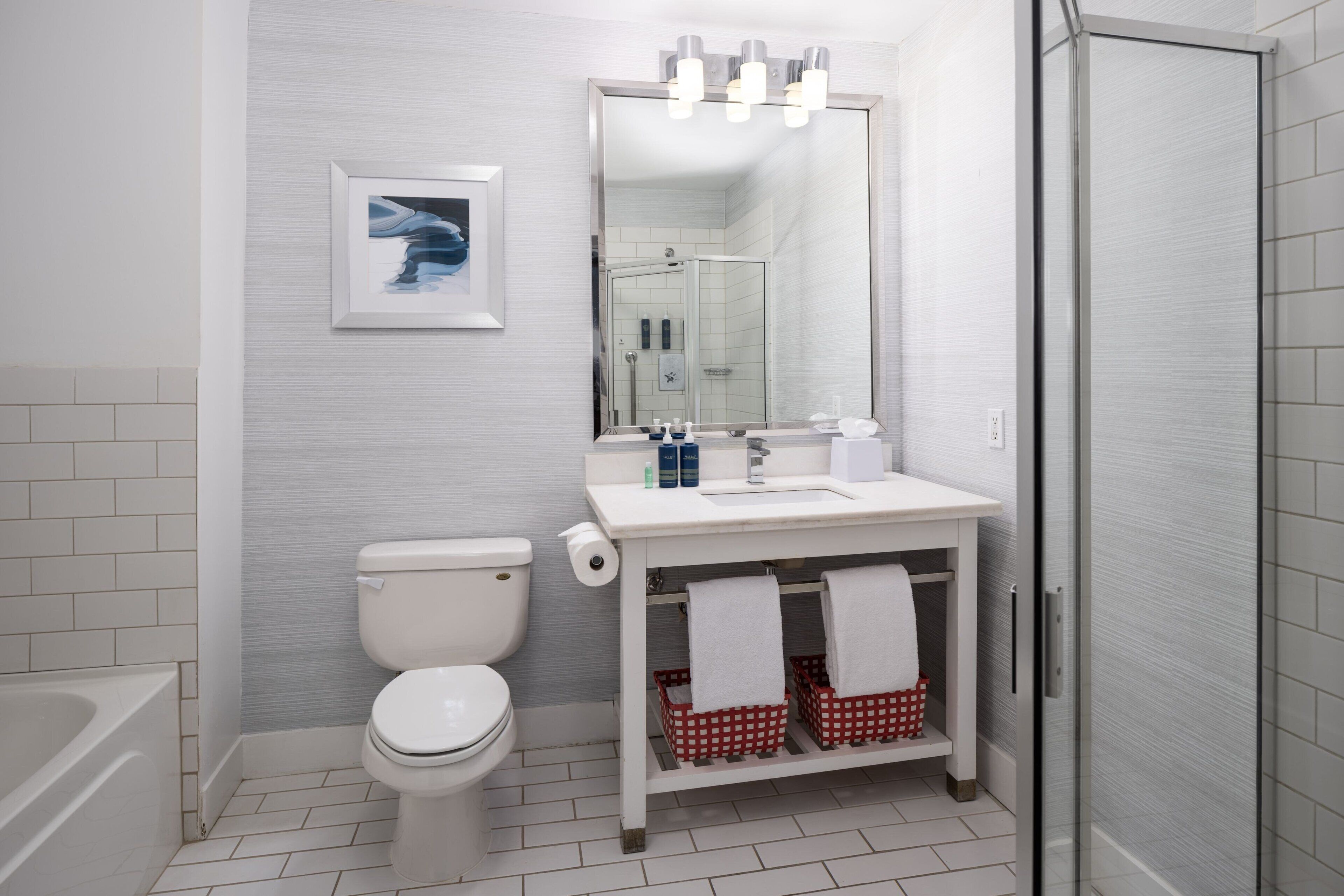 suite, 1 king bed, balcony, corner (balcony) | bathroom | free toiletries, hair dryer, towels