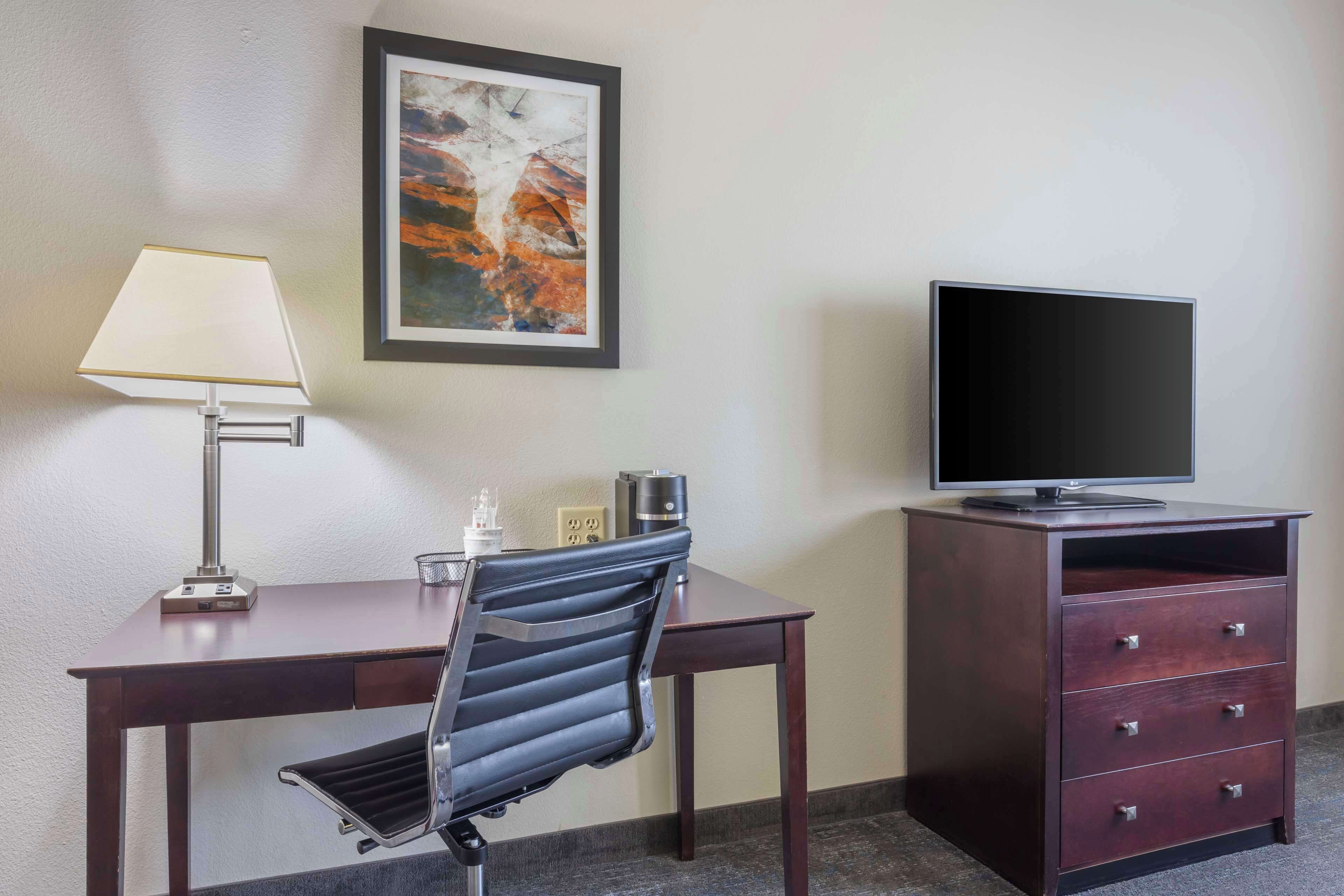 standard room, 1 king bed, non smoking, refrigerator & microwave | pillow-top beds, desk, laptop workspace, iron/ironing board