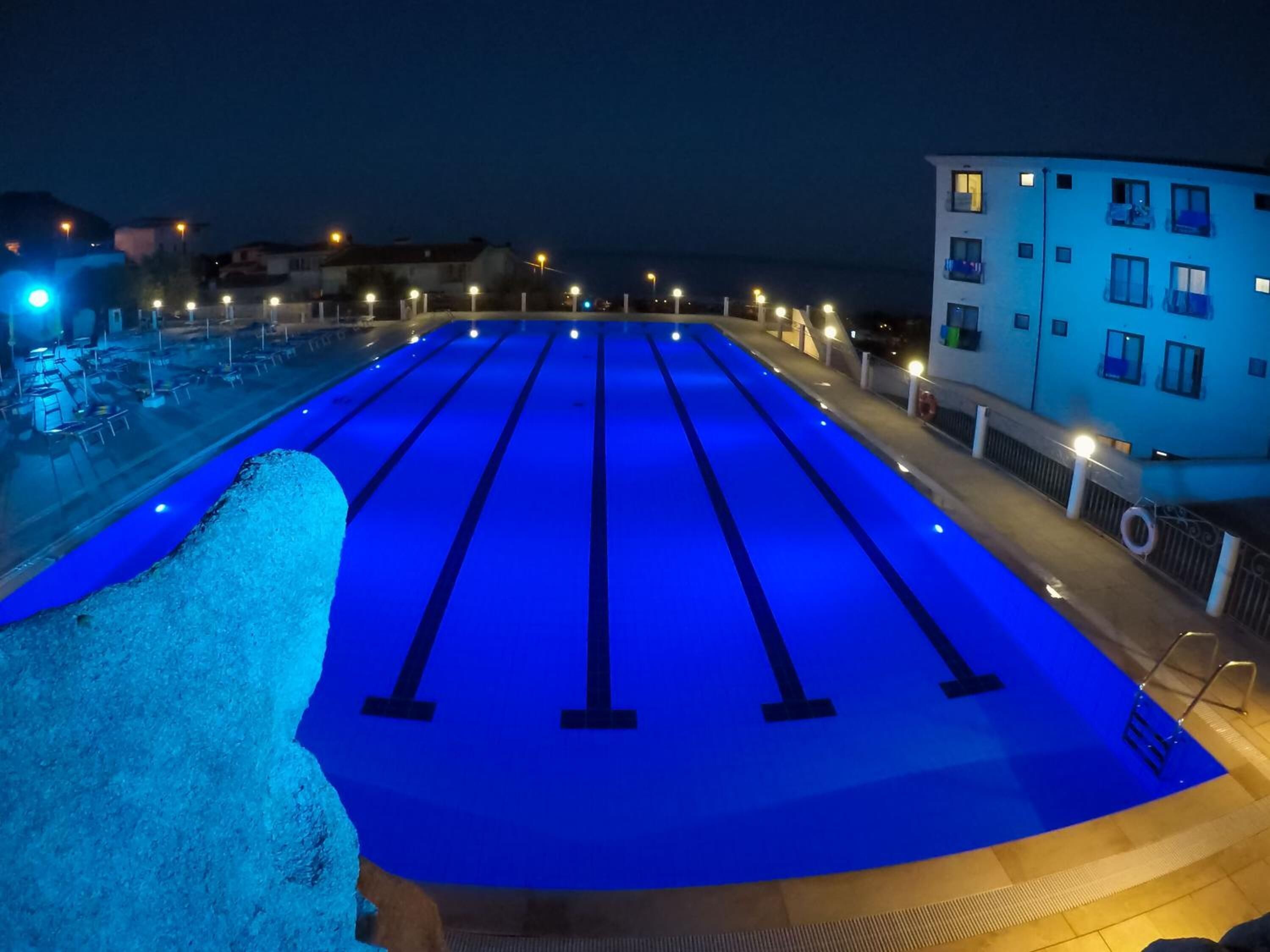 seasonal outdoor pool, open 7 am to 7 pm, pool umbrellas, pool loungers