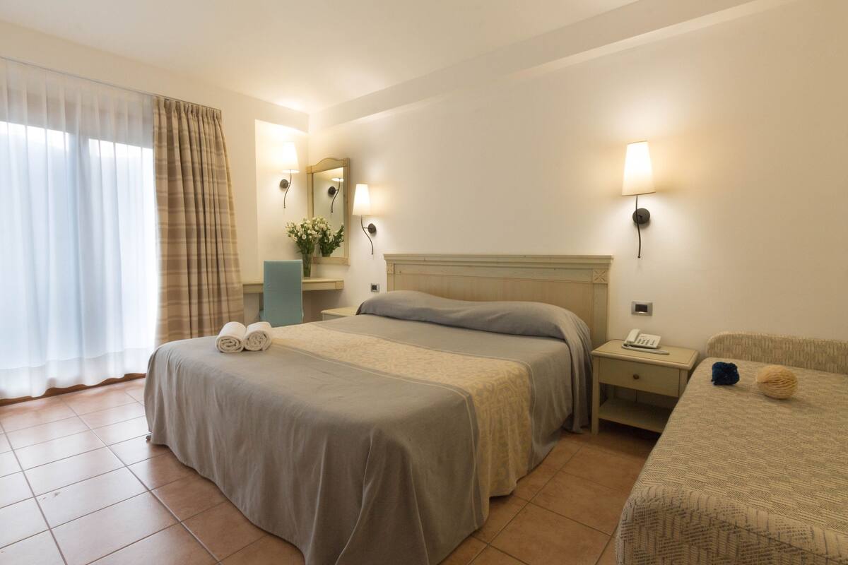1 dormitorio, ropa de cama de alta calidad, edredones de plumas