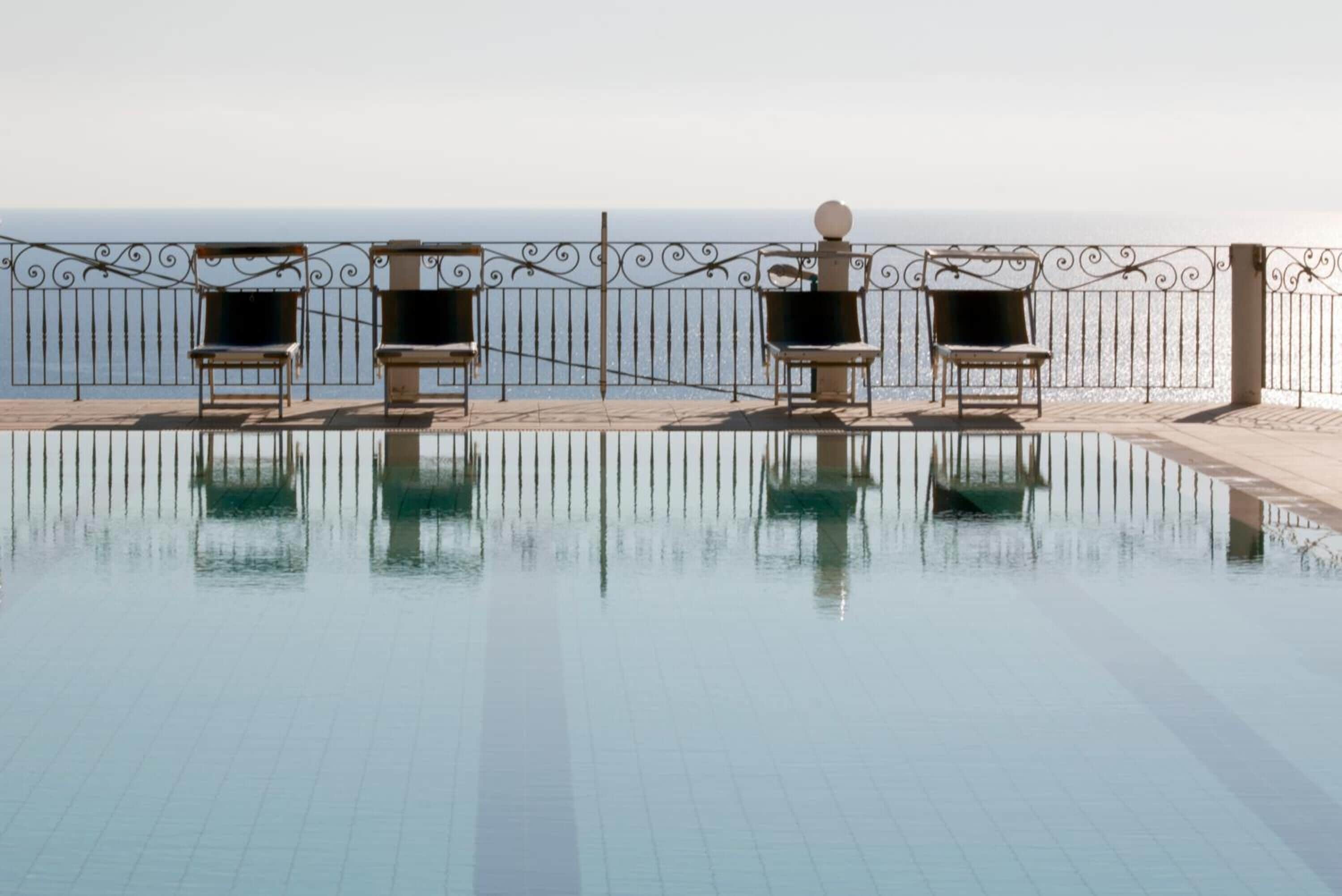 Seasonal outdoor pool, open 7 AM to 7 PM, pool umbrellas, sun loungers