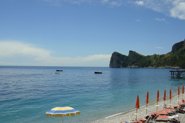 Private beach nearby, black sand, sun loungers, beach umbrellas