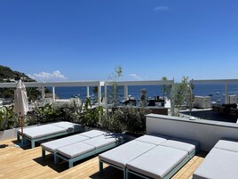 Indoor pool, seasonal outdoor pool, pool umbrellas, sun loungers