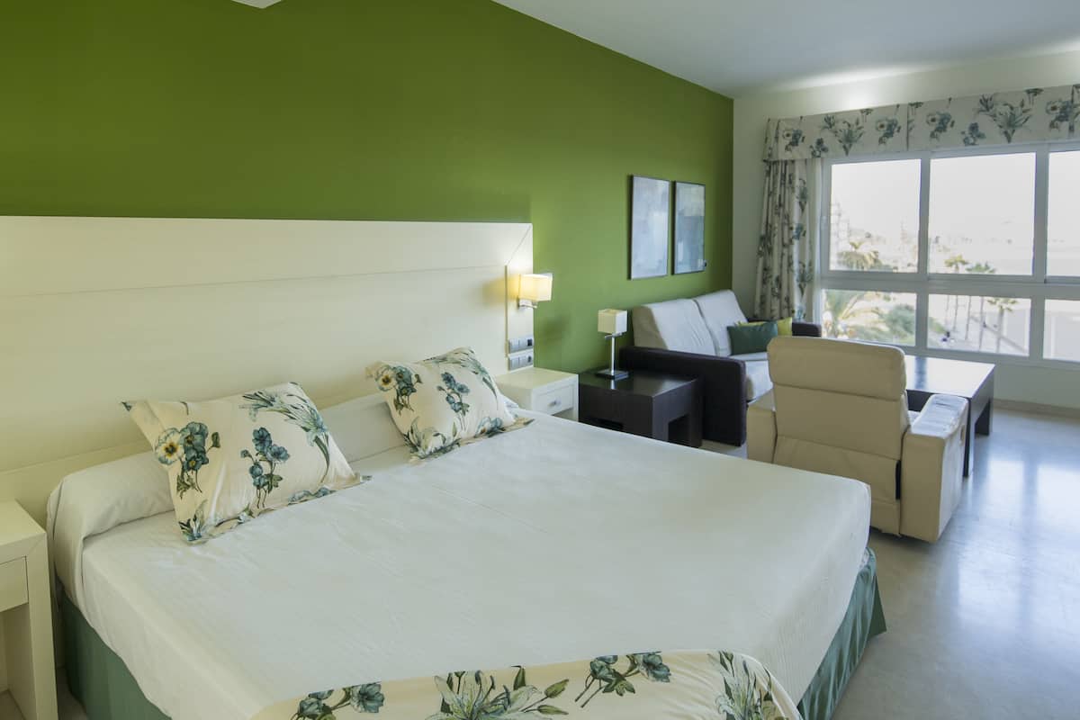 double room (with living area) | 1 bedroom, in-room safe, desk, blackout curtains