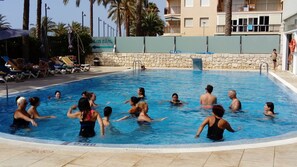 Outdoor pool, pool umbrellas, pool loungers