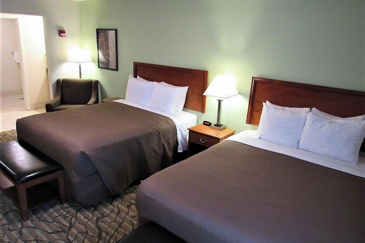 deluxe double queen, kitchenette | premium bedding, desk, blackout curtains, soundproofing