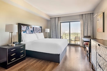 Premium bedding, pillowtop beds, in-room safe, blackout drapes at Hilton Grand Vacations Club Las Palmeras Orlando