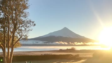 Private beach, black sand, free beach cabanas, sun loungers