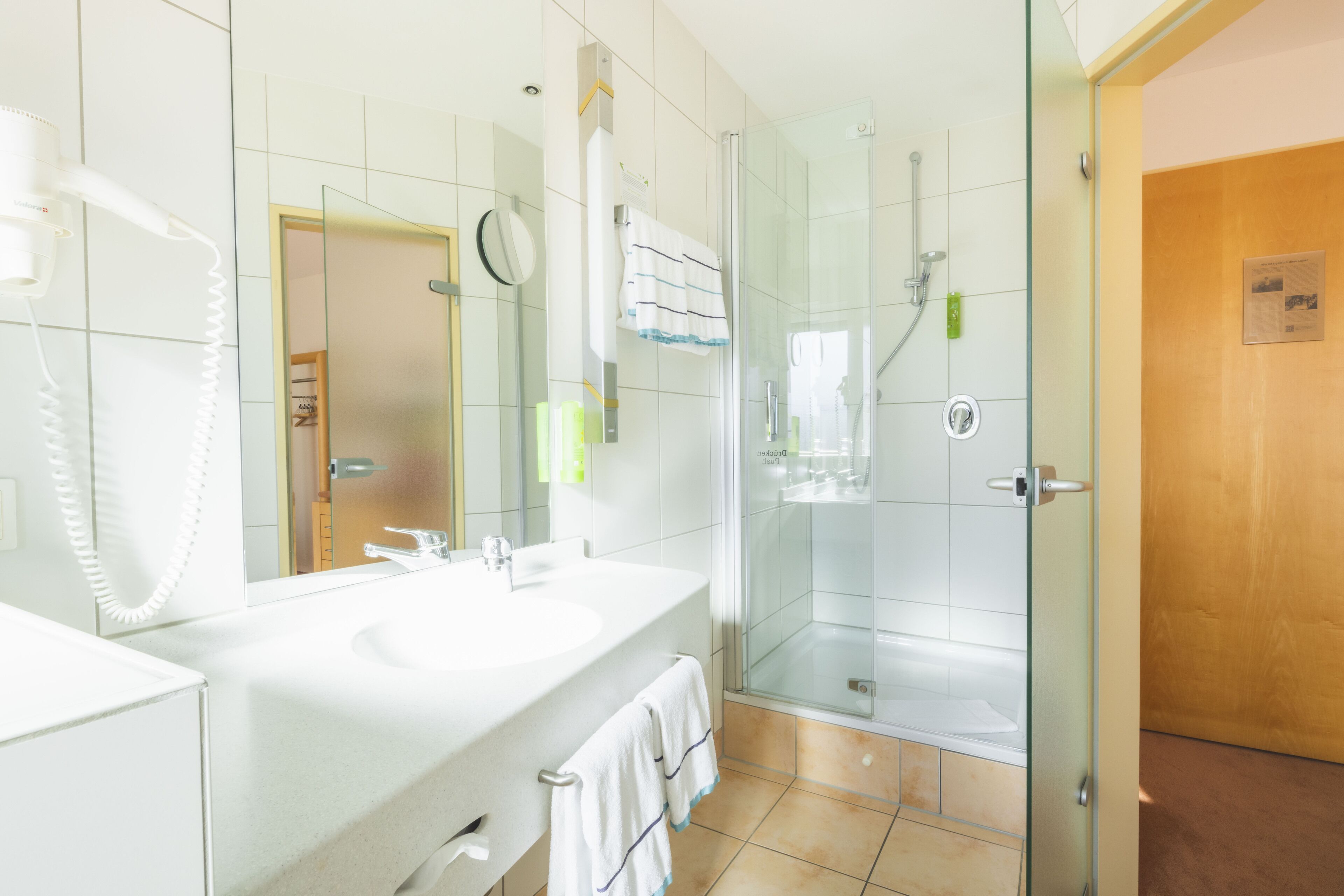 standard room | bathroom | eco-friendly toiletries, hair dryer, towels, soap