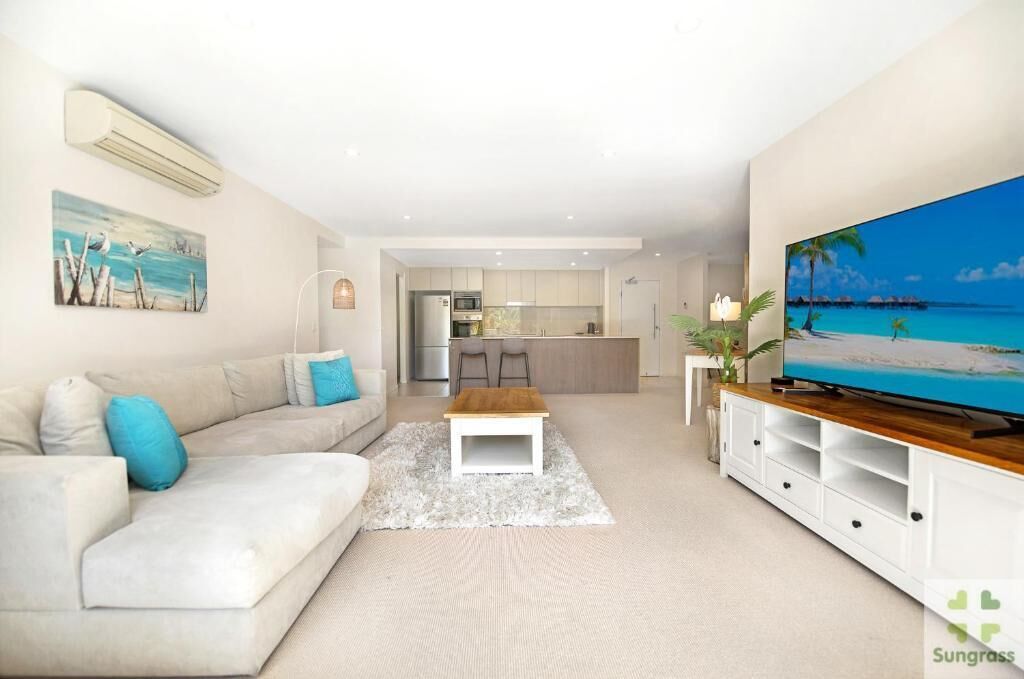 Executive Two Bedroom Apartment | Living area | Flat-screen TV