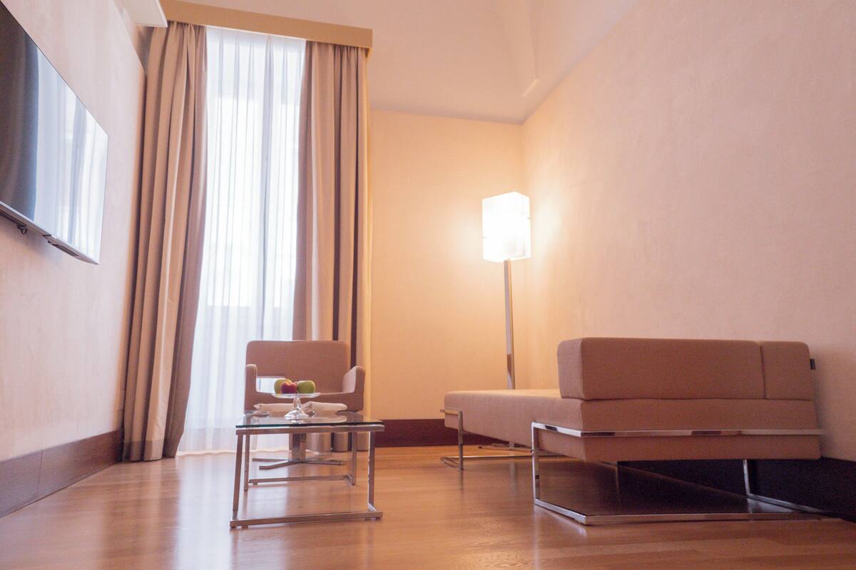 junior suite deluxe | living area | lcd tv