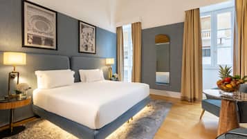 Suite junior, balcón | Ropa de cama hipoalergénica y minibar