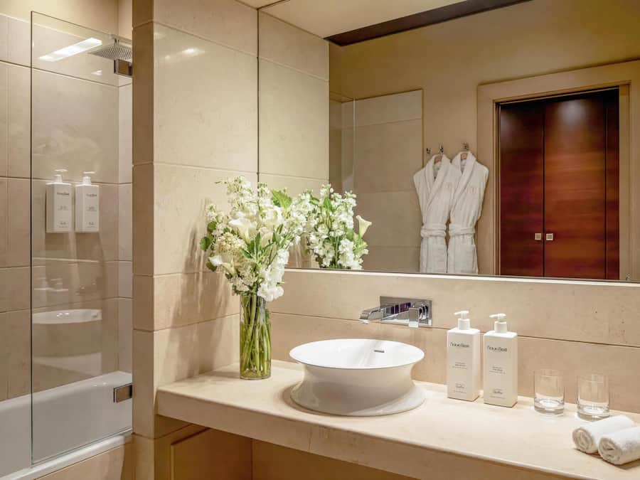 Separate tub and shower, free toiletries, hair dryer, bathrobes