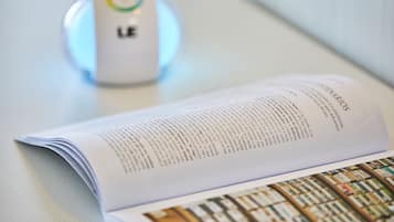 An open book with text on a table.