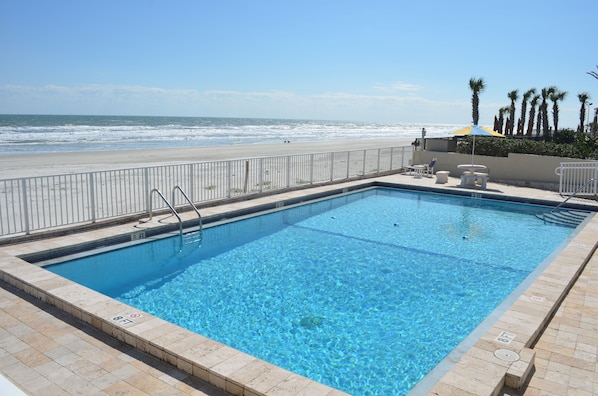 Outdoor pool, pool umbrellas, sun loungers