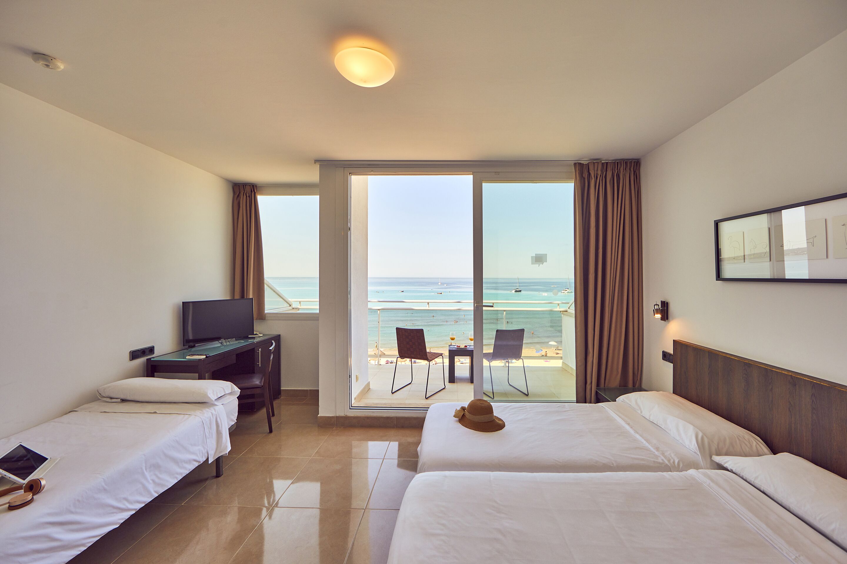 deluxe triple room, terrace, sea view | desk, blackout curtains, free wifi, bed sheets