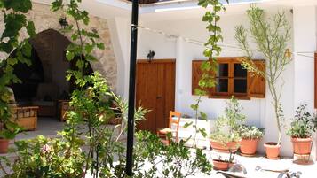 Apartamento, 1 quarto | 1 quarto, camas com colchões pillow-top, ferros/tábuas de passar roupa