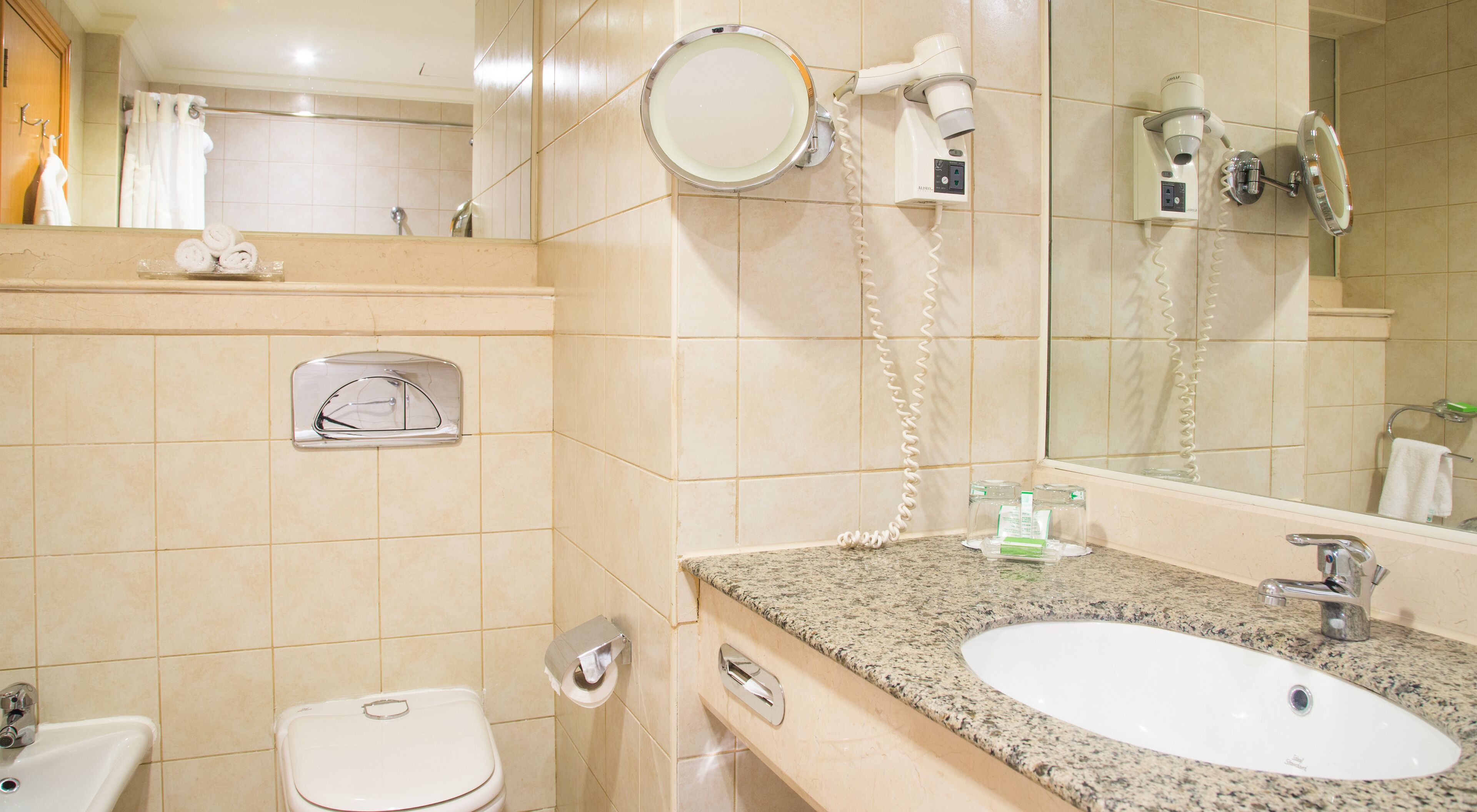 combined shower/bathtub, free toiletries, hair dryer, bathrobes