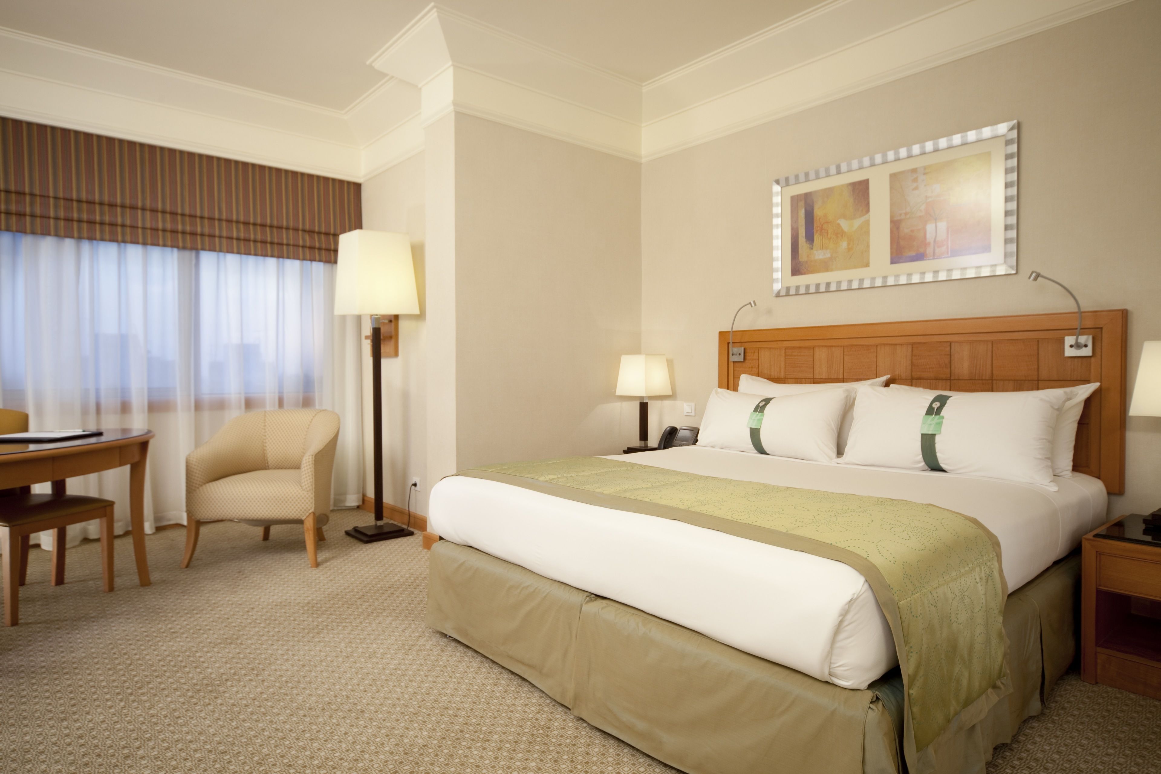 Frette Italian sheets, premium bedding, down comforters, minibar