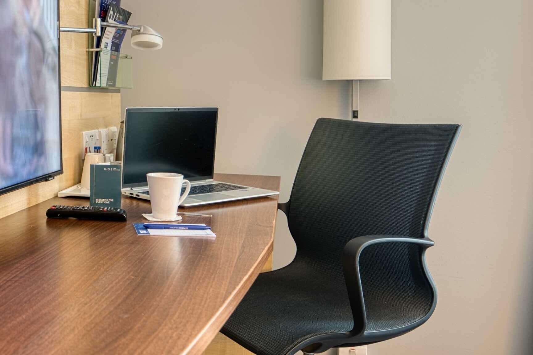 desk, blackout curtains, iron/ironing board, free cots/infant beds