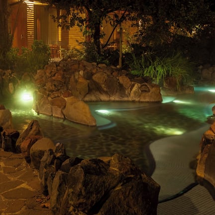 Deluxe Room, 1 King Bed, Hot Tub, Pool View | Pool | Outdoor pool