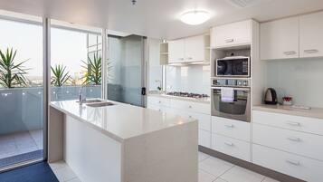 Three Bedroom Penthouse Loft | Private kitchen | Full-size fridge, microwave, stovetop, dishwasher