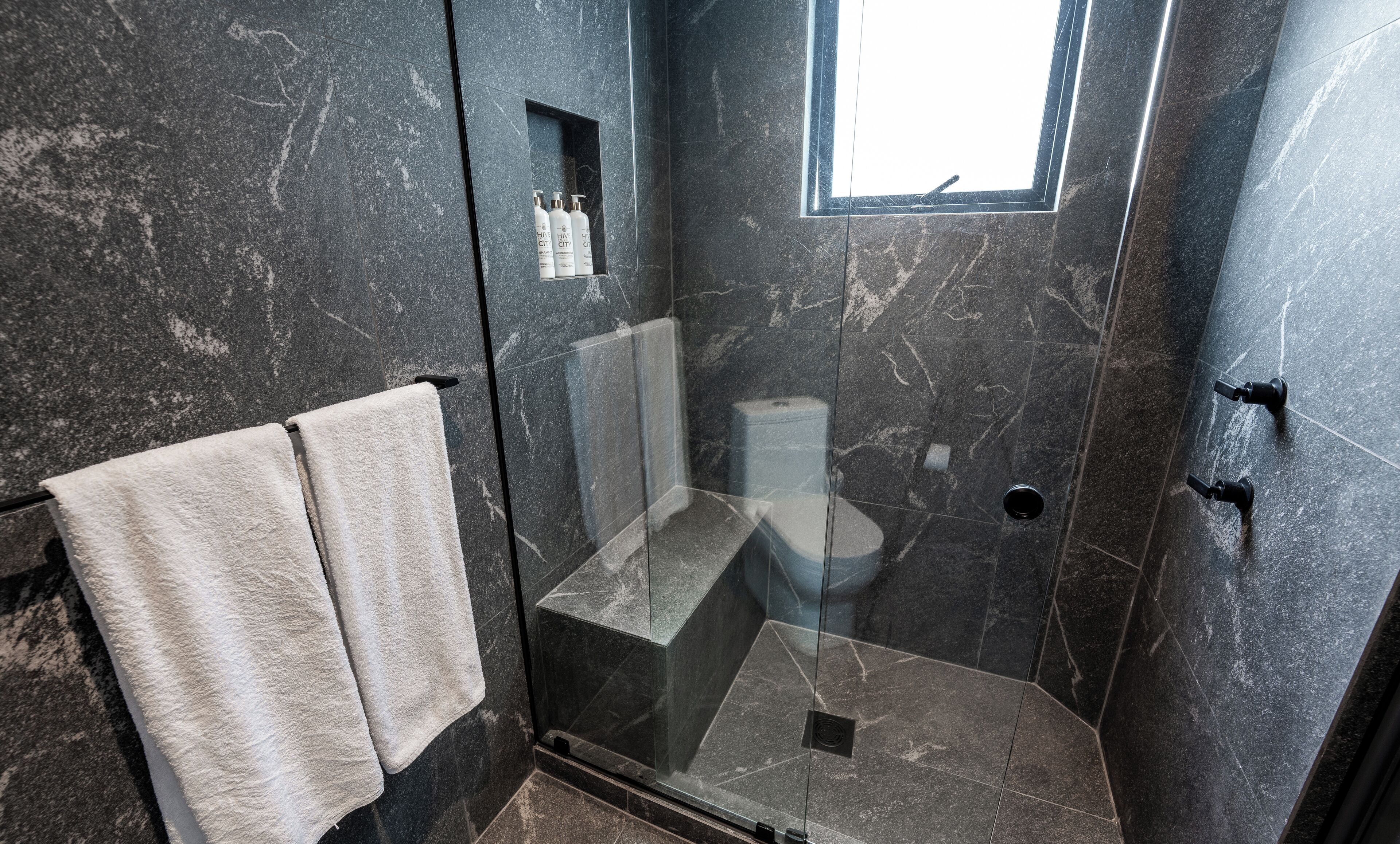 shower, free toiletries, hair dryer, towels