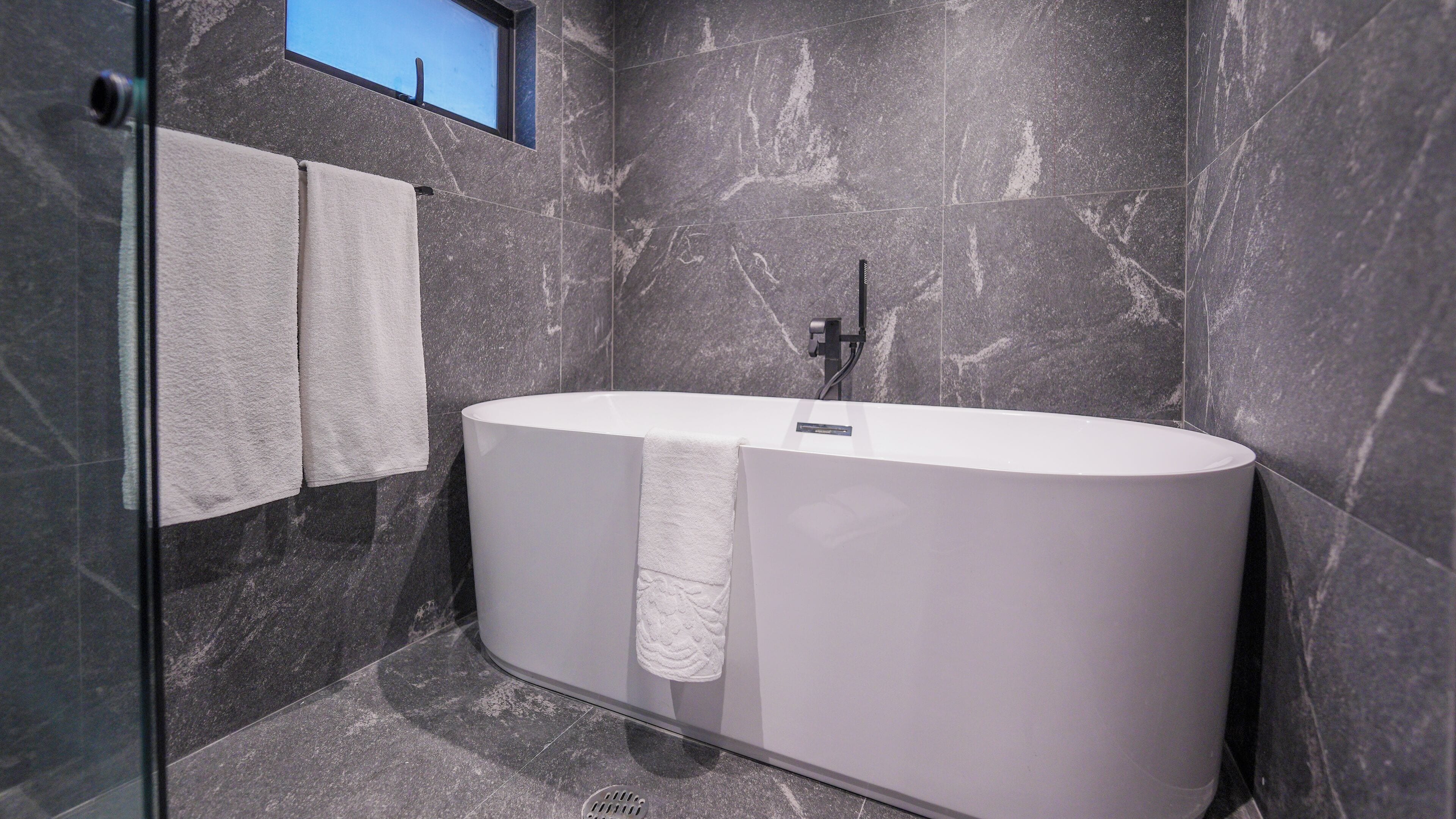 shower, free toiletries, hair dryer, towels