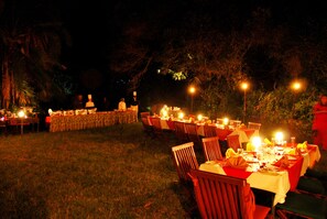 Enjoy a formal dining experience surrounded by lush gardens.