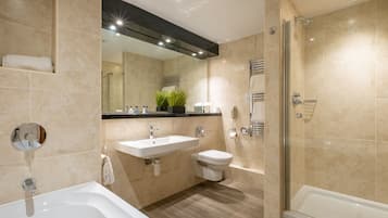 Separate tub and shower, free toiletries, hair dryer, towels