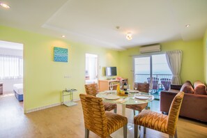 Family Suite, 2 Bedrooms | Living area | 32-inch LCD TV with cable channels, TV, fireplace - Best Bella Pattaya (Pattaya)