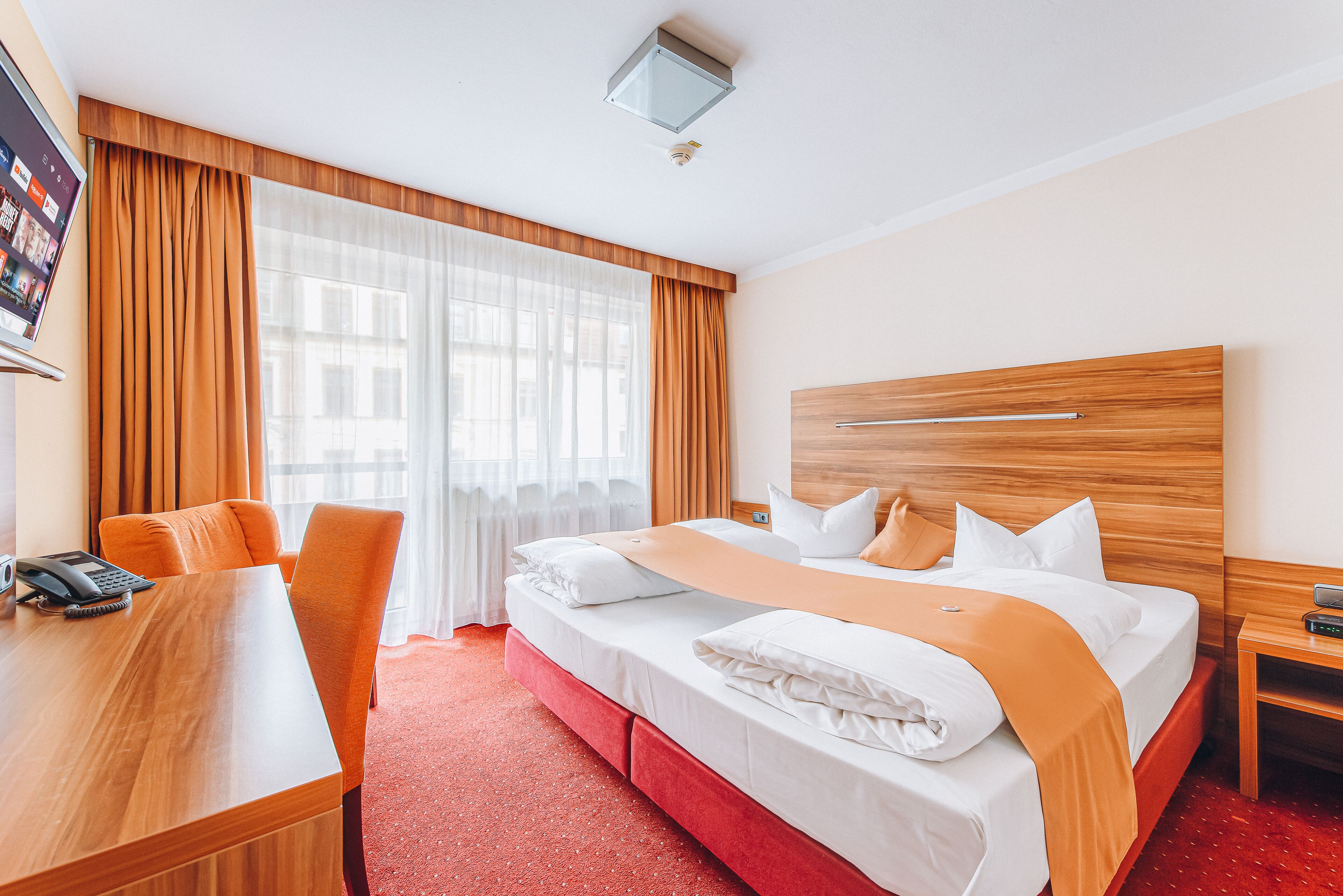 standard double room | hypo-allergenic bedding, down duvets, in-room safe, desk