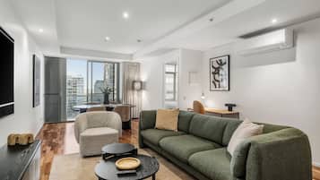 Two Bedroom Apartment | Living area | 55-inch LCD TV with digital channels, TV