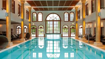 Indoor pool, outdoor pool, pool umbrellas, pool loungers