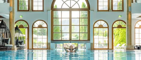 Indoor pool, outdoor pool, pool umbrellas, pool loungers