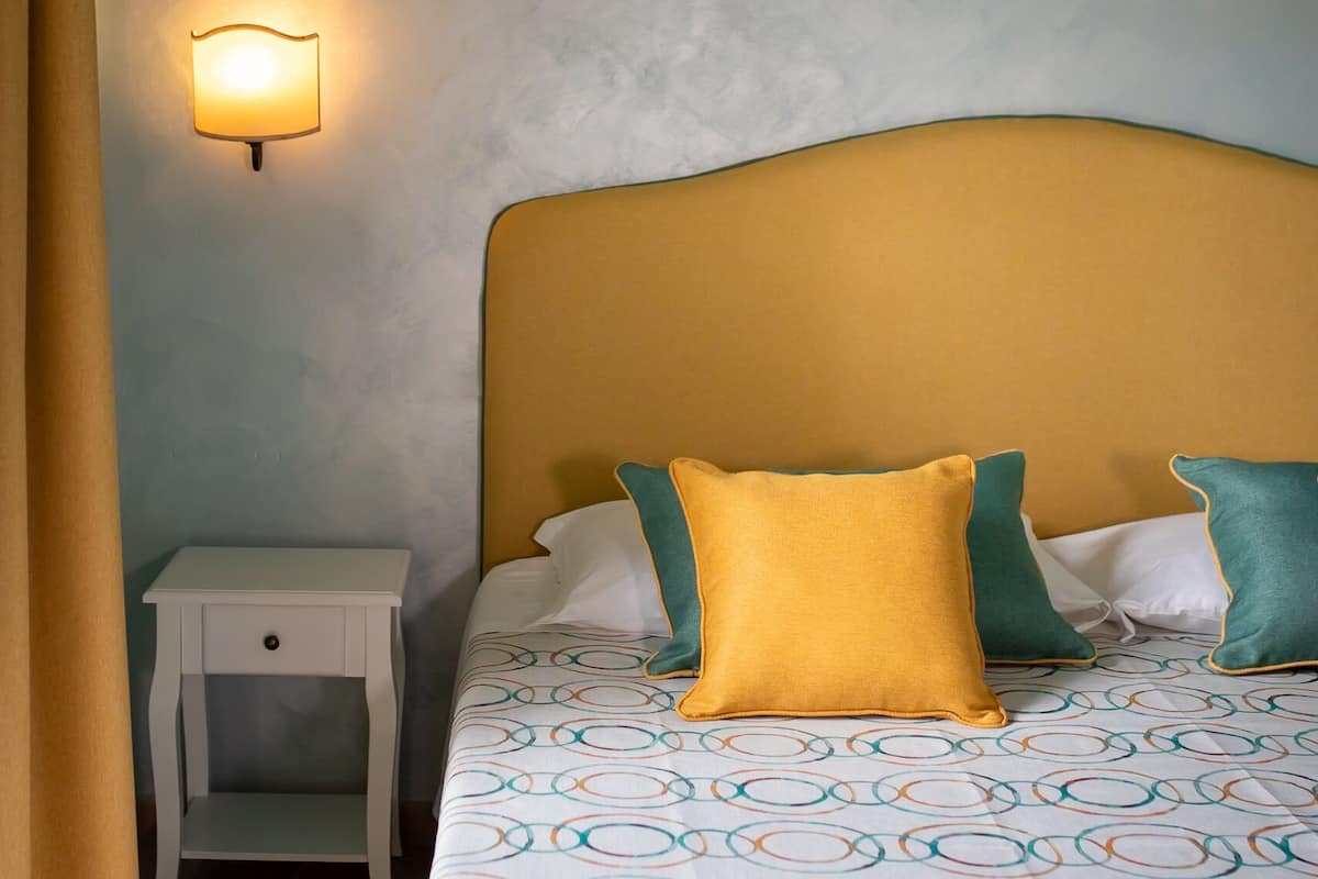 Hypo-allergenic bedding, down duvets, minibar, in-room safe