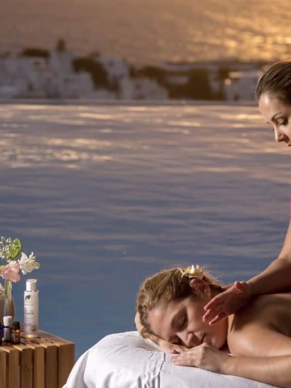 Experience a rejuvenating massage on a comfortable table, surrounded by soothing ambiance and serene views.
