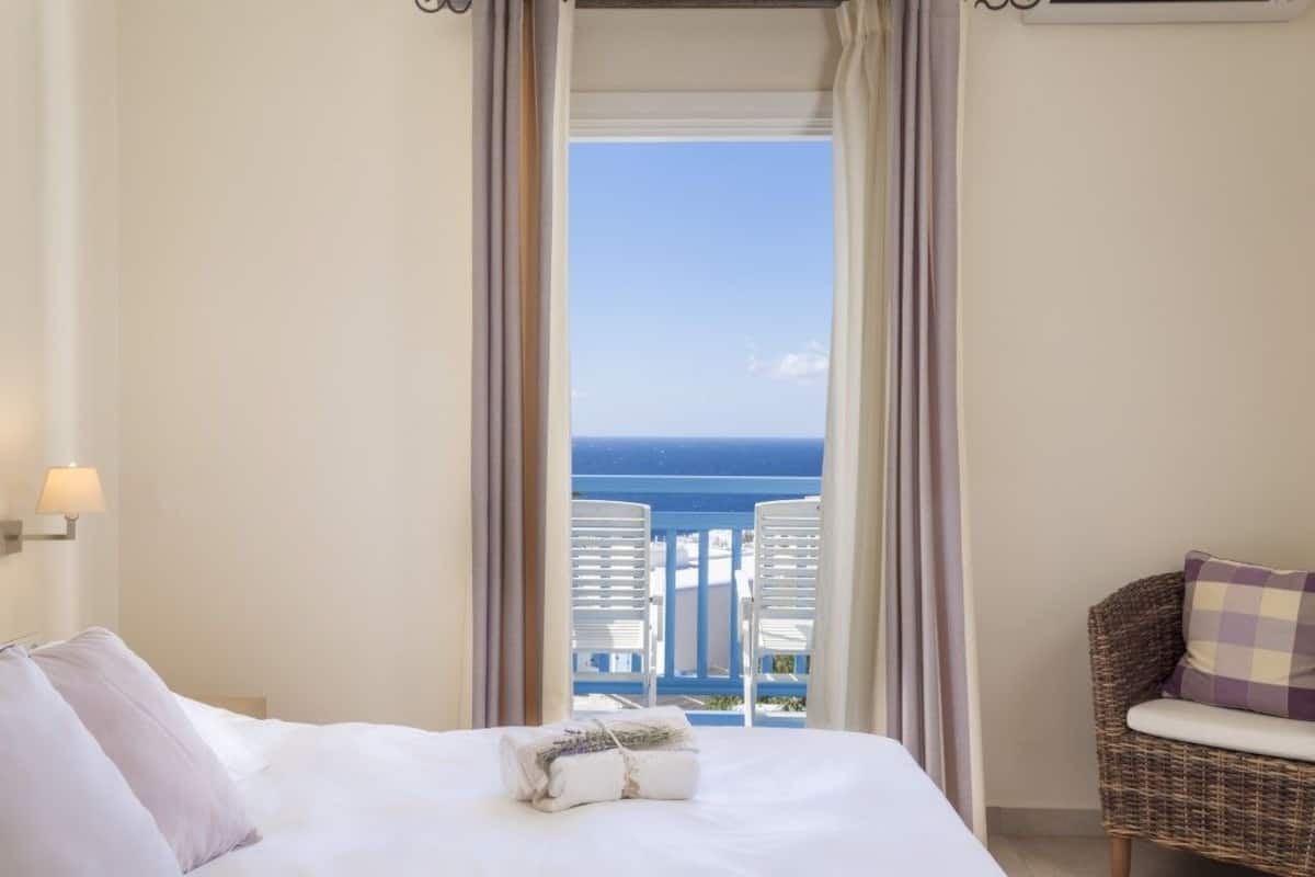 standard room, partial sea view | 1 bedroom, premium bedding, in-room safe, iron/ironing board